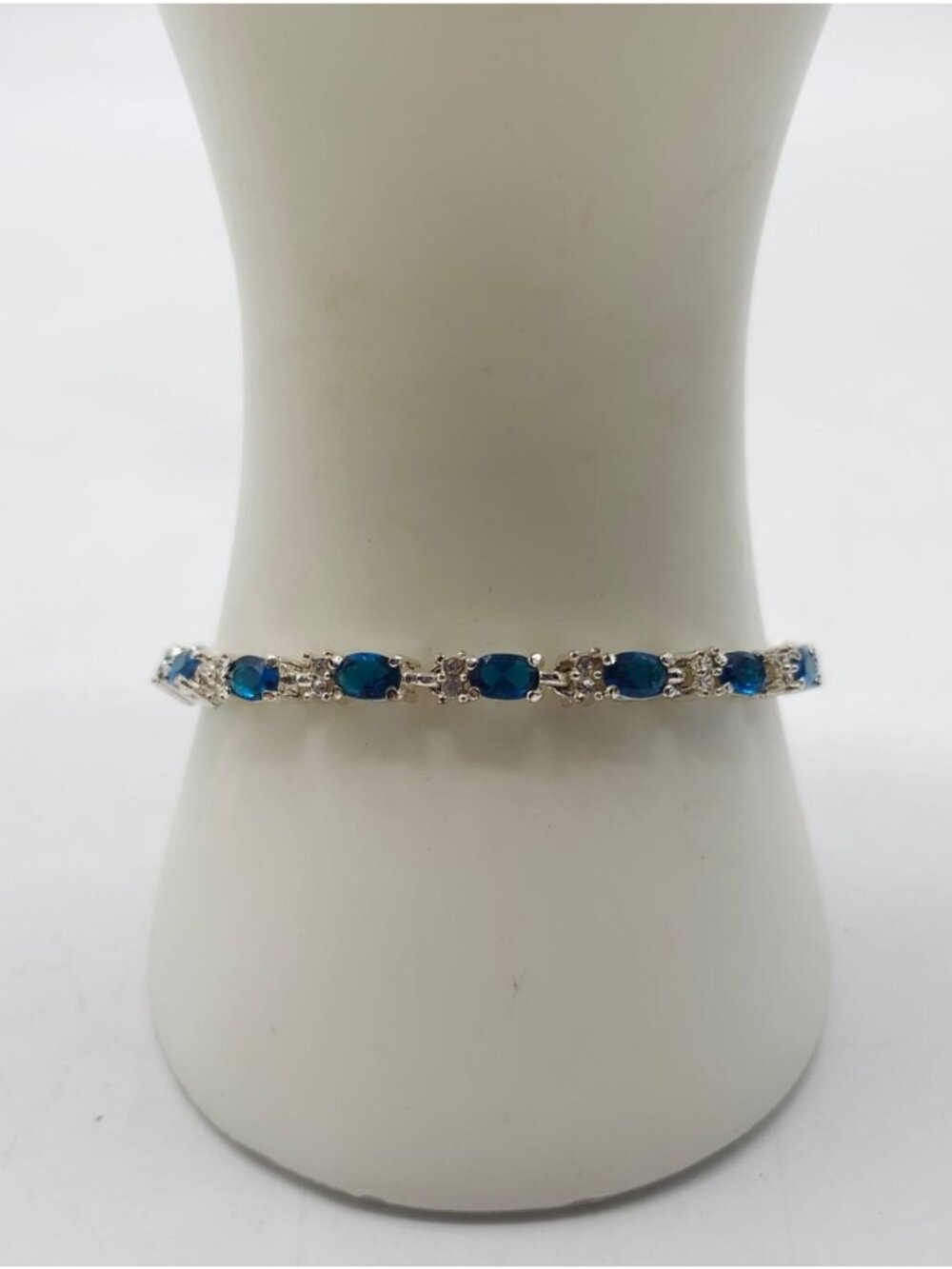 Silver Tone Avon Bracelet With Blue Clear Stones Secure Clasp 7.5 - 8.75  Inches